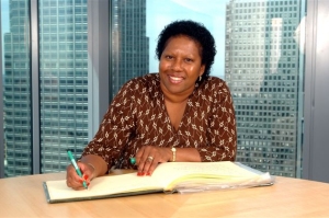 Eula Clarke signing the tribute book for Nelson Mandela